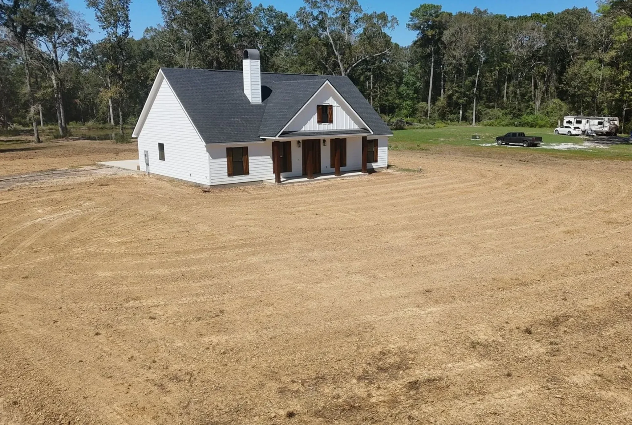Prepared residential site around a newly built home
