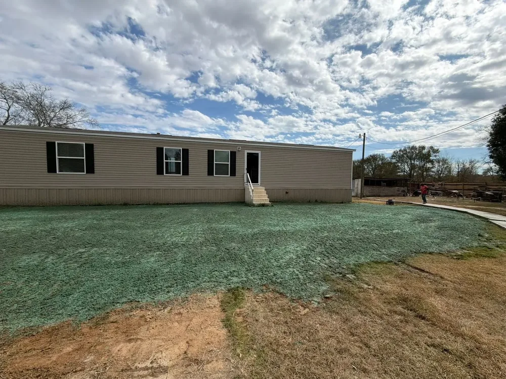 Completed hydroseeding project around a home