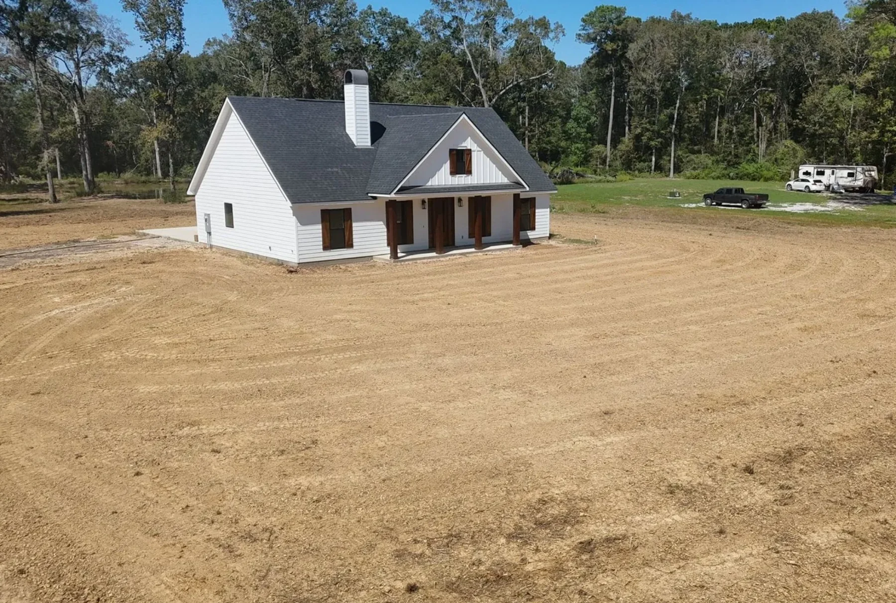 Prepared residential site around a newly built home